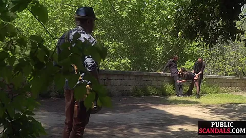 Disgraced shameless slut deepthroats in public 3some outdoor