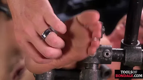BDSM submissive babe suffers in foot spanking and fetish