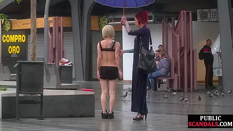 Female servant whipped outdoor by redhead femdom lady