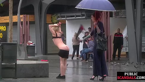 Female servant whipped outdoor by redhead femdom lady