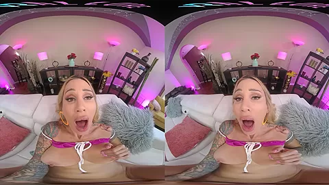 Inked up blonde with huge tits gets off with her toys in VR