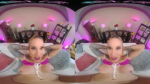 Inked up blonde with huge tits gets off with her toys in VR