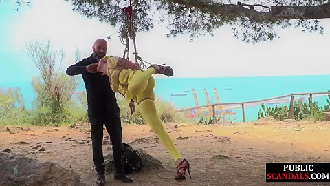 Public whore suspension bondage exposed with buttplug in ass