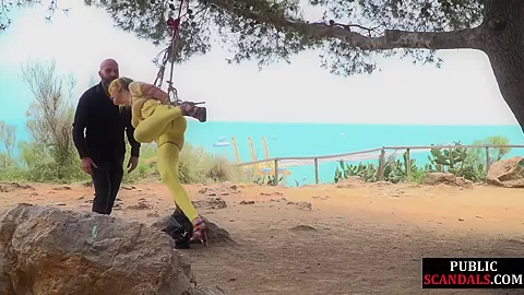 Public whore suspension bondage exposed with buttplug in ass