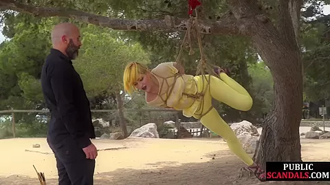 Public whore suspension bondage exposed with buttplug in ass