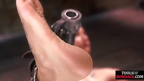 Whipped BDSM tattooed slut in bondage dominated by guy