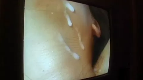 Busty asian MILF slut covered in cumshot