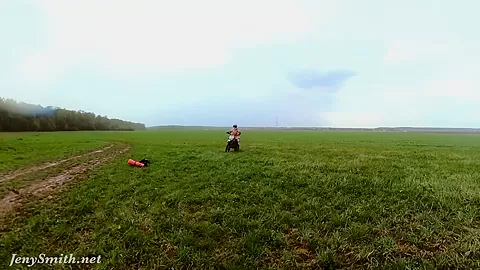 Naked woman riding a Dirt Bike