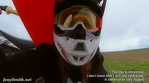 Naked woman riding a Dirt Bike