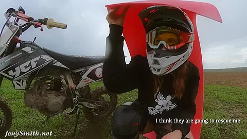 Naked woman riding a Dirt Bike