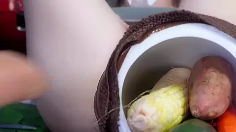 Babe gets carrot in ass