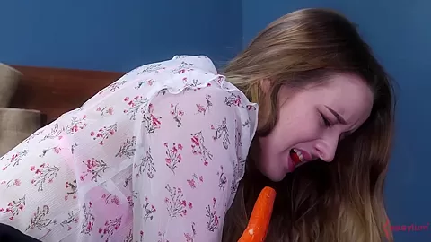 Babe gets carrot in ass