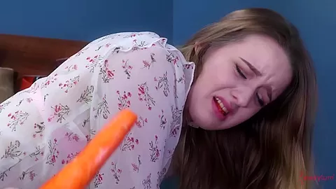 Babe gets carrot in ass