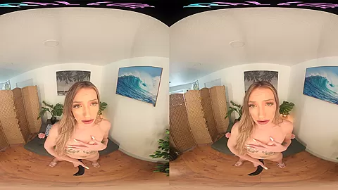 Skinny blonde strips from her bikini and masturbates in VR