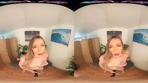 Skinny blonde strips from her bikini and masturbates in VR