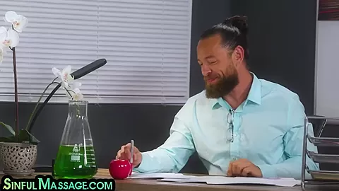 Oiled college babe rides professor cock in the classroom