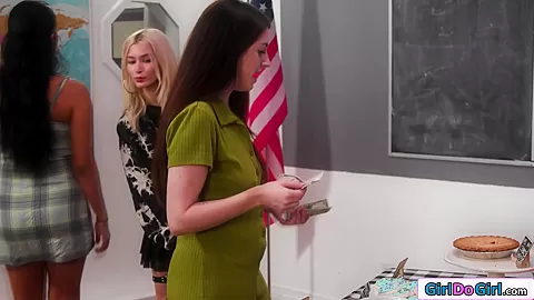 Busty stepmom licks stepdaughter under table during bakesale