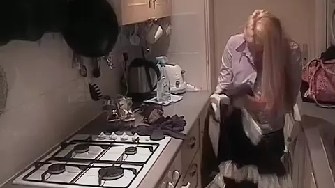 Merry blonde KazBxxx in maid uniform putting on a tampon
