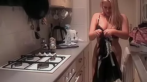 Merry blonde KazBxxx in maid uniform putting on a tampon