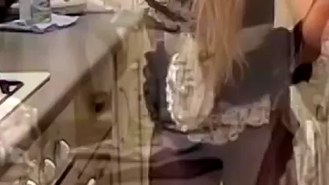 Merry blonde KazBxxx in maid uniform putting on a tampon