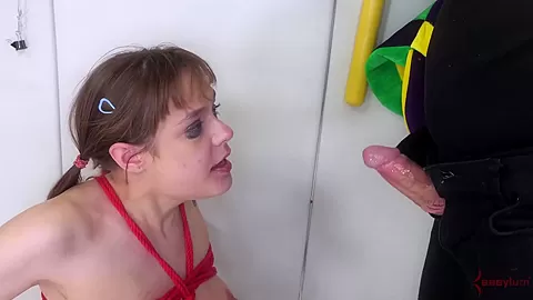 Facialized teen 18+ licks her doms shaved ballsack