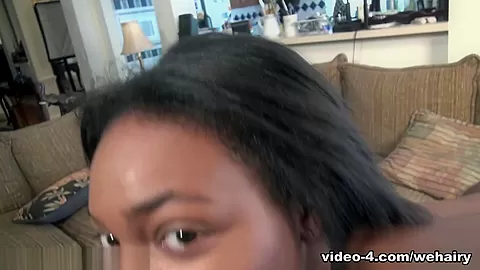 Bobbie Rains masturbates on her brown couch