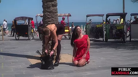 Submissive babe exposed outdoor in public by domina