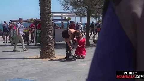 Submissive babe exposed outdoor in public by domina