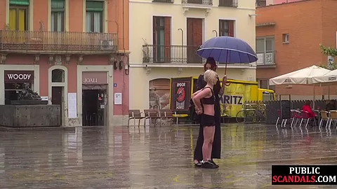 Public slut humiliated on the street by her strict domina