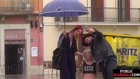Public slut humiliated on the street by her strict domina