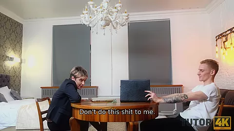 TUTOR4K. MILF wearing official suit makes younger guy go crazy about fucking