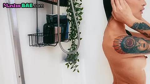 Petite solo babe rubbing her soaking clit in the shower