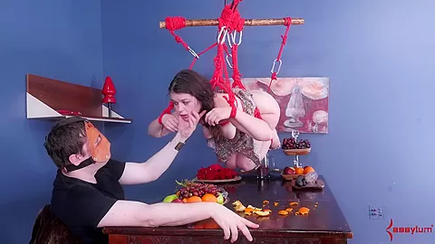 Rope tied slut gagging on dick