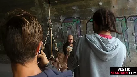 Public spanking of blonde euro babe in ropes getting fucked