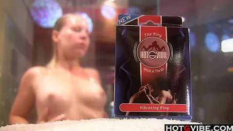 Juicy blondie pleases her pussy in the shower