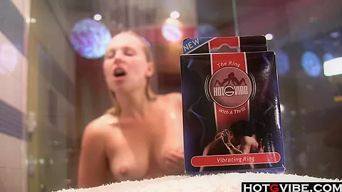 Juicy blondie pleases her pussy in the shower