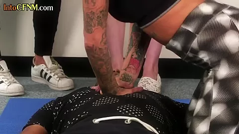 CFNM femdom group sucking off black guy in gym