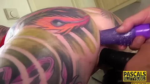 Toyed and paddled tattooed submissive