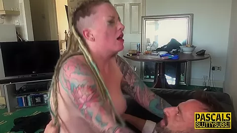 Inked submissive gets spanked and fucks