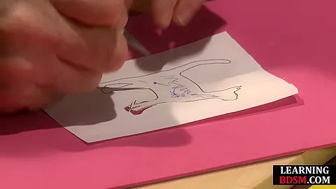 BDSM dom spanks brand onto his subject