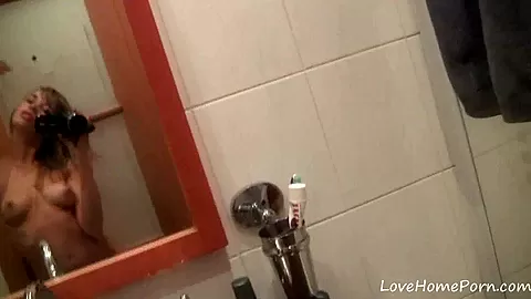 Babe records herself in front of a mirror