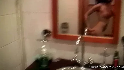 Babe records herself in front of a mirror