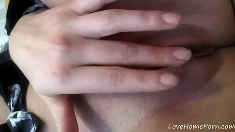 Cute girl with glasses shows her shaved cunt