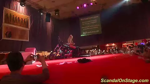 busty Milf stripping on stage