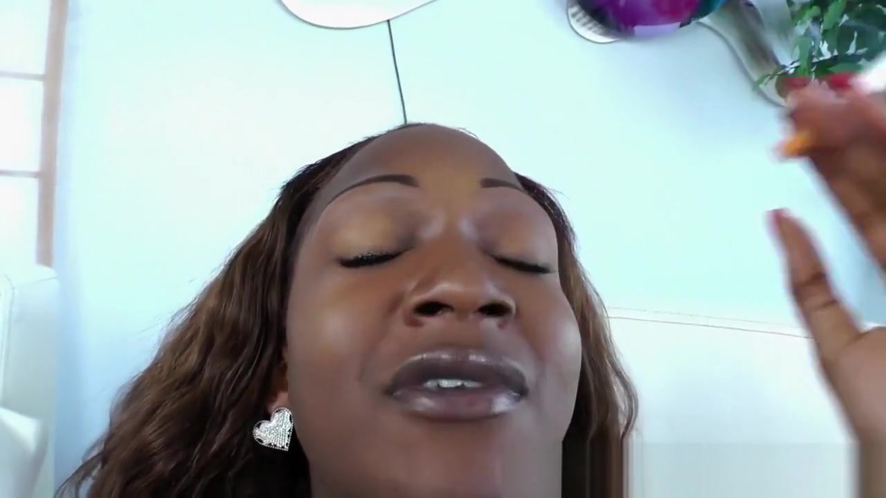 Wanking ebony tgirl strokes her prick