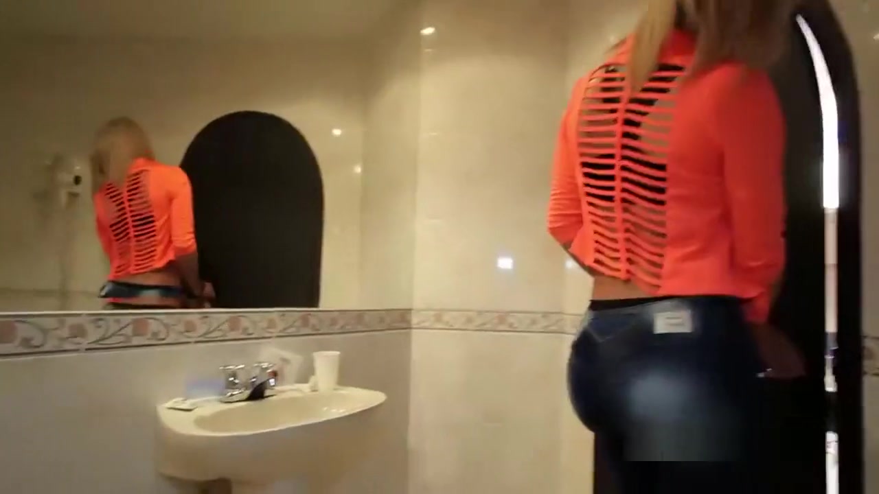 Blonde tgirl in stockings cumming
