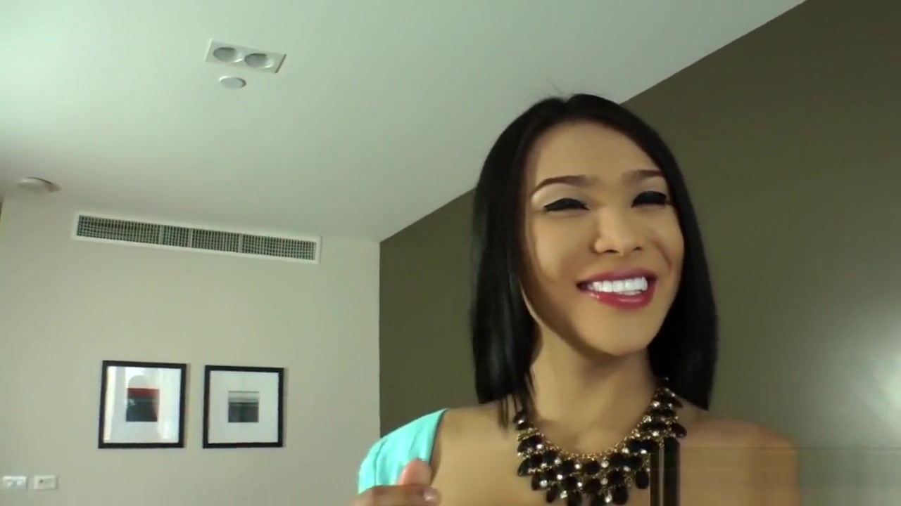 Busty asian ts tugging on her fat cock