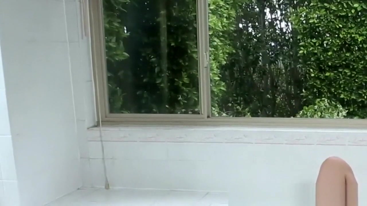 Latina trans babe masturbating in the bathtub