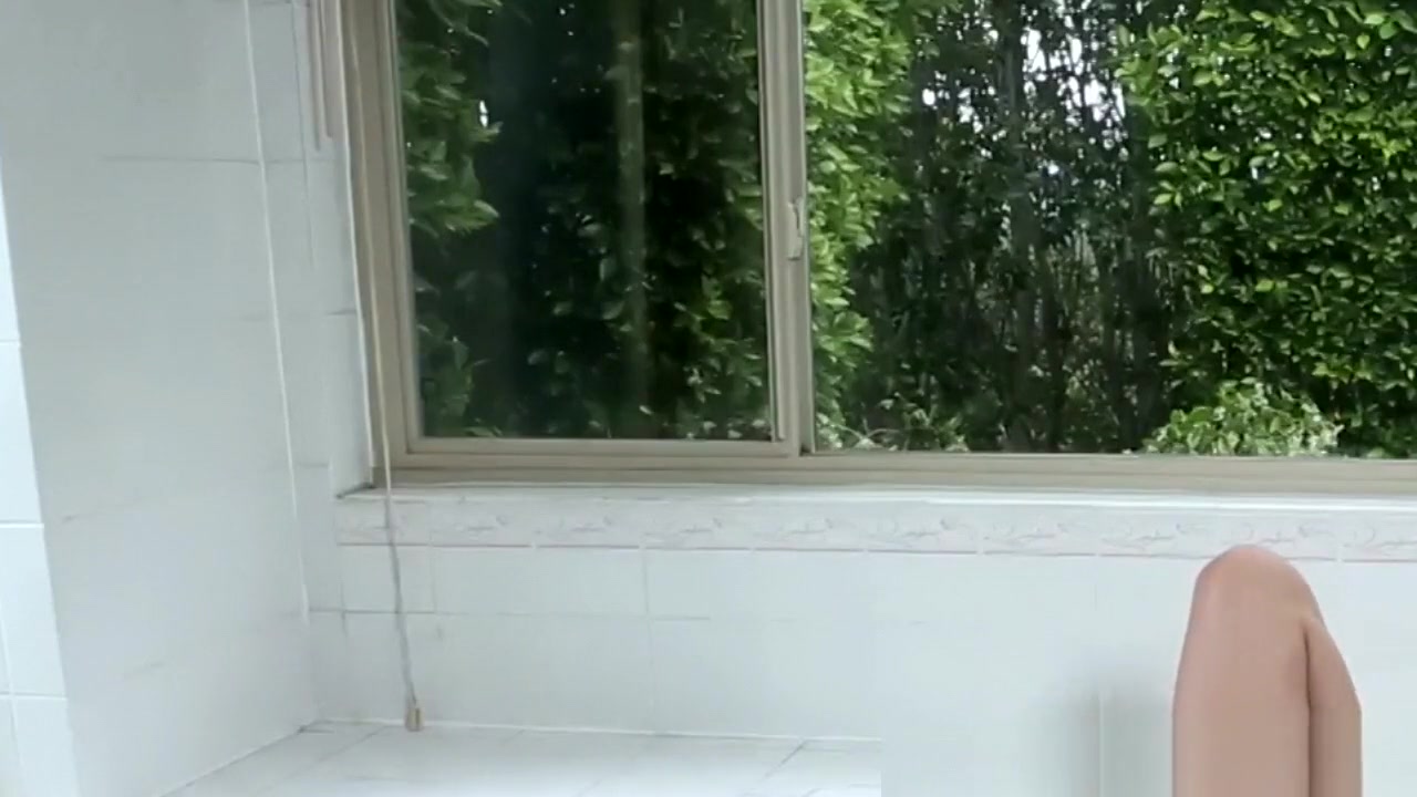 Latina trans babe masturbating in the bathtub