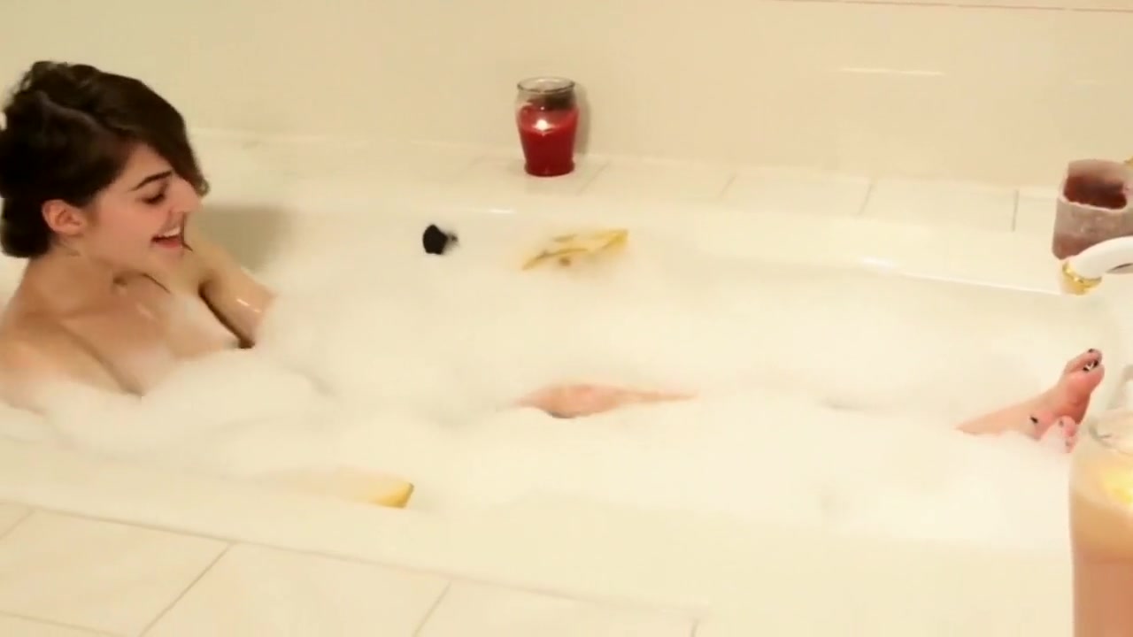 Smalltit tgirl bathing and pissing
